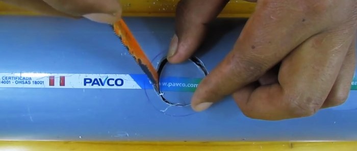How to glue a thin PVC pipe into a large one without a tee