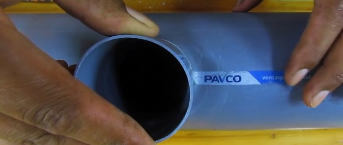 How to glue a thin PVC pipe into a large one without a tee