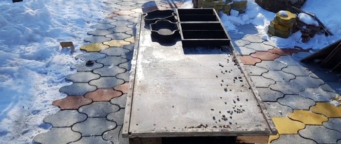 Meja bergetar do-it-yourself yang paling berpatutan diperbuat daripada pintu tayar dan enjin mesin basuh