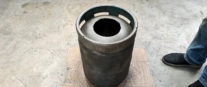 Paano gumawa ng 2 in 1 wood stove mula sa isang gas cylinder na may parallel na pagpainit ng tubig