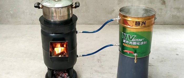 Paano gumawa ng 2 in 1 wood stove mula sa isang gas cylinder na may parallel na pagpainit ng tubig