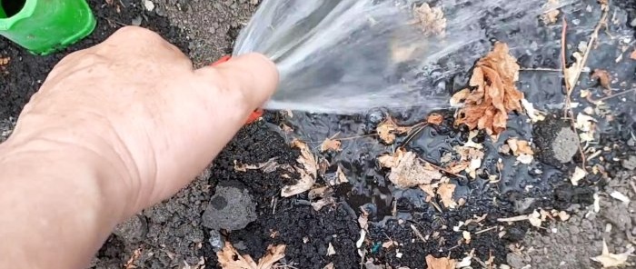 Life hack for gardeners Watering from a barrel without a pump