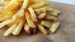 Healthy French fries in the oven. Large portion without excess oil