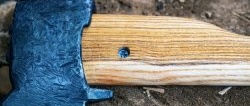 How to securely place an ax on an ax handle without wedges. American system