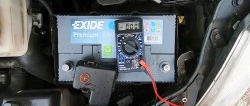 How to check the battery status using a multimeter