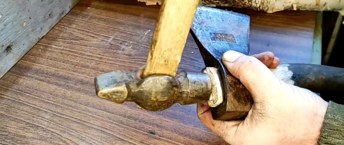 How to attach an ax to an ax handle using rubber