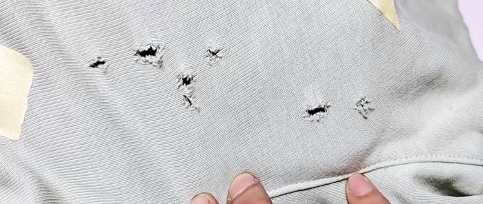 Cómo coser silenciosamente un agujero en la ropa