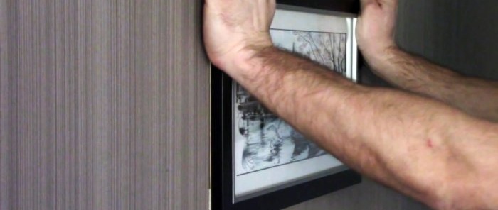 How to hang a picture without drilling nails or screws