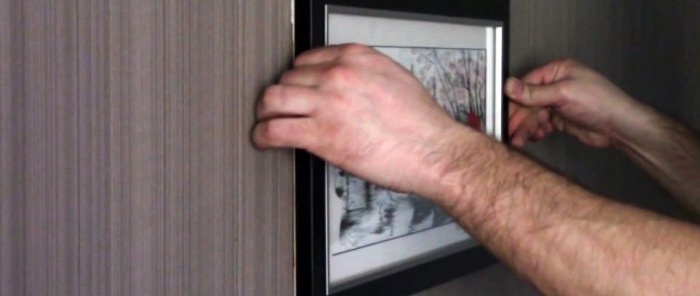 How to hang a picture without drilling nails or screws
