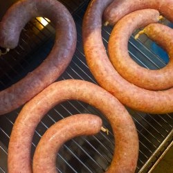 Natural sausage in the oven: a simple recipe